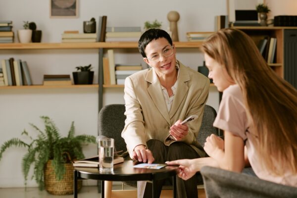 Woman interviewing another woman