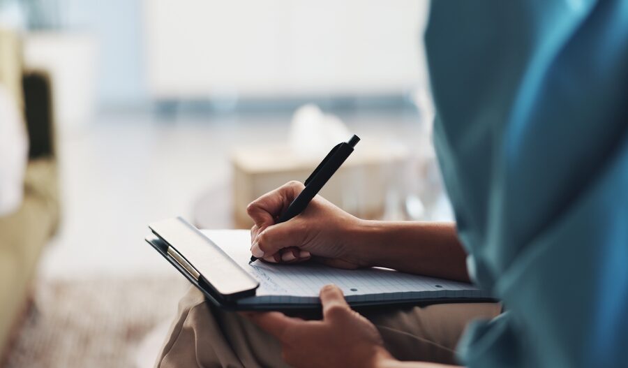 writing down on a piece of paper